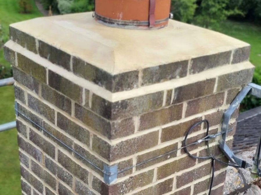 Chimney stack repointing and capping by Shoreside Roofing
