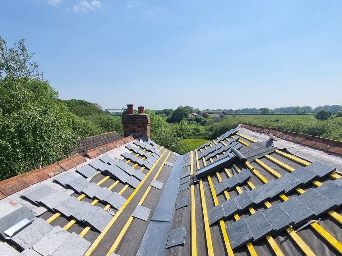 New tiled roof under construction by Shoreside Roofing in Hampshire